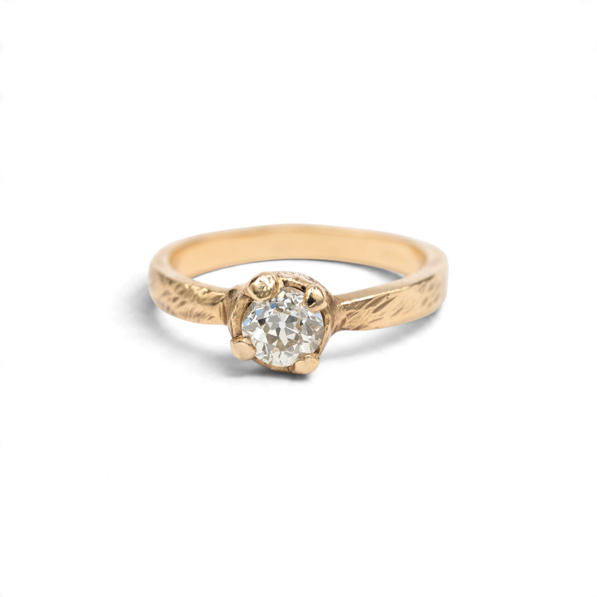 Stórica Studio Bramble 0.59 ct Old European cut diamond solitaire in 14k yellow gold with a carved bark-like band and chunky prongs
