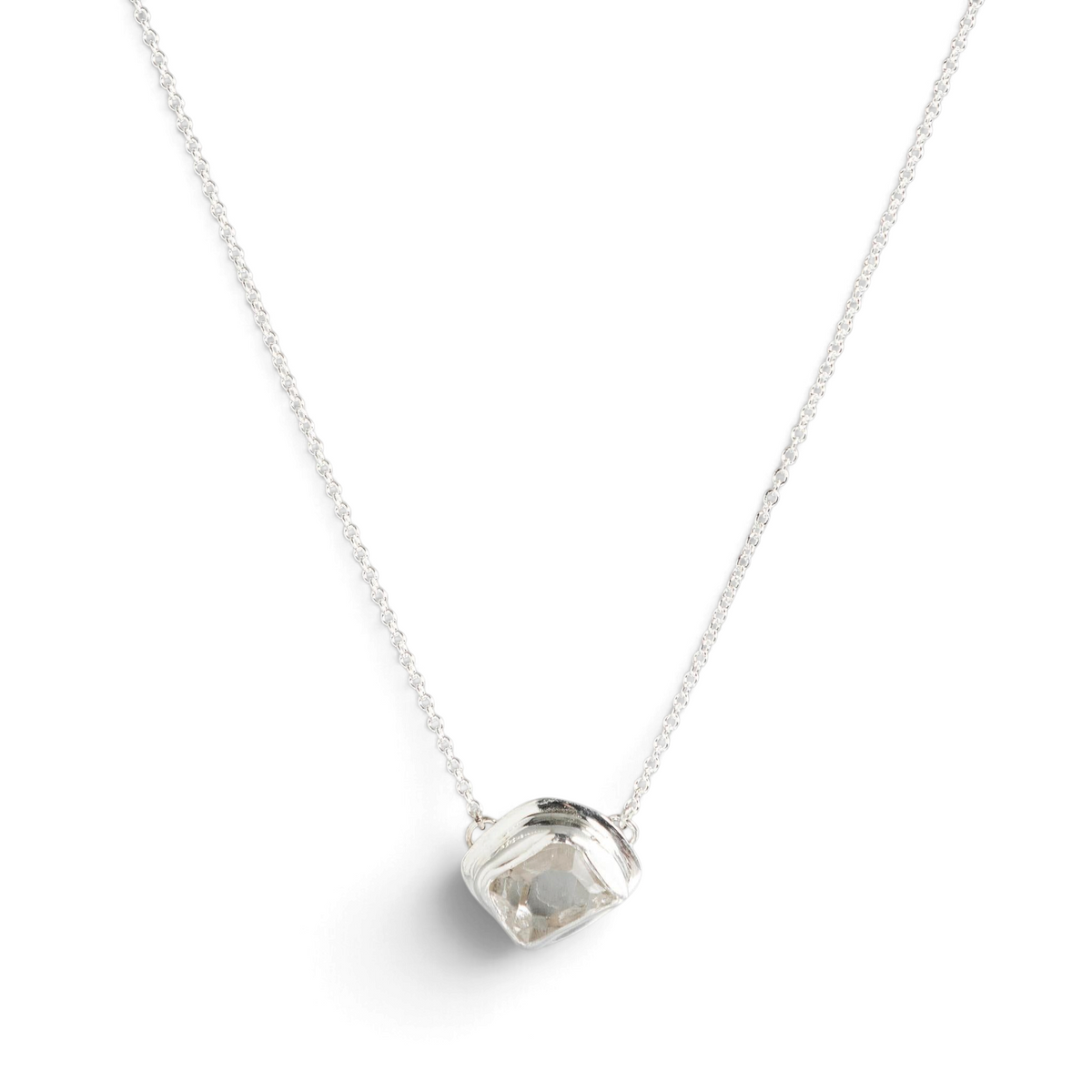 Stórica Studio East-West Glacier necklace featuring a raw Herkimer quartz crystal in a sterling silver bezel setting.