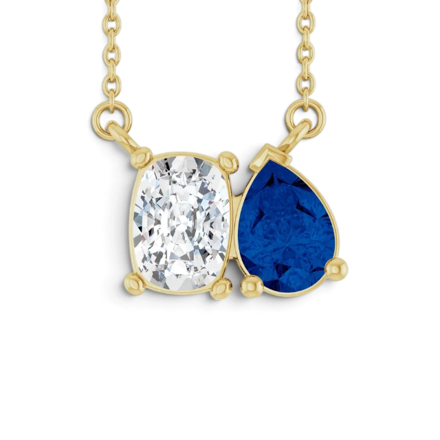 Stórica Studio Tethys toi et moi necklace featuring a cushion lab-grown diamond and pear blue sapphire in 14k gold.