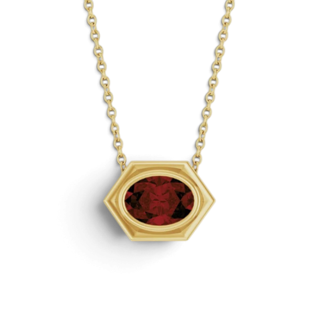 Stórica Studio Tidepool necklace featuring a deep red garnet oval gemstone in a 14k yellow gold bezel slide setting.