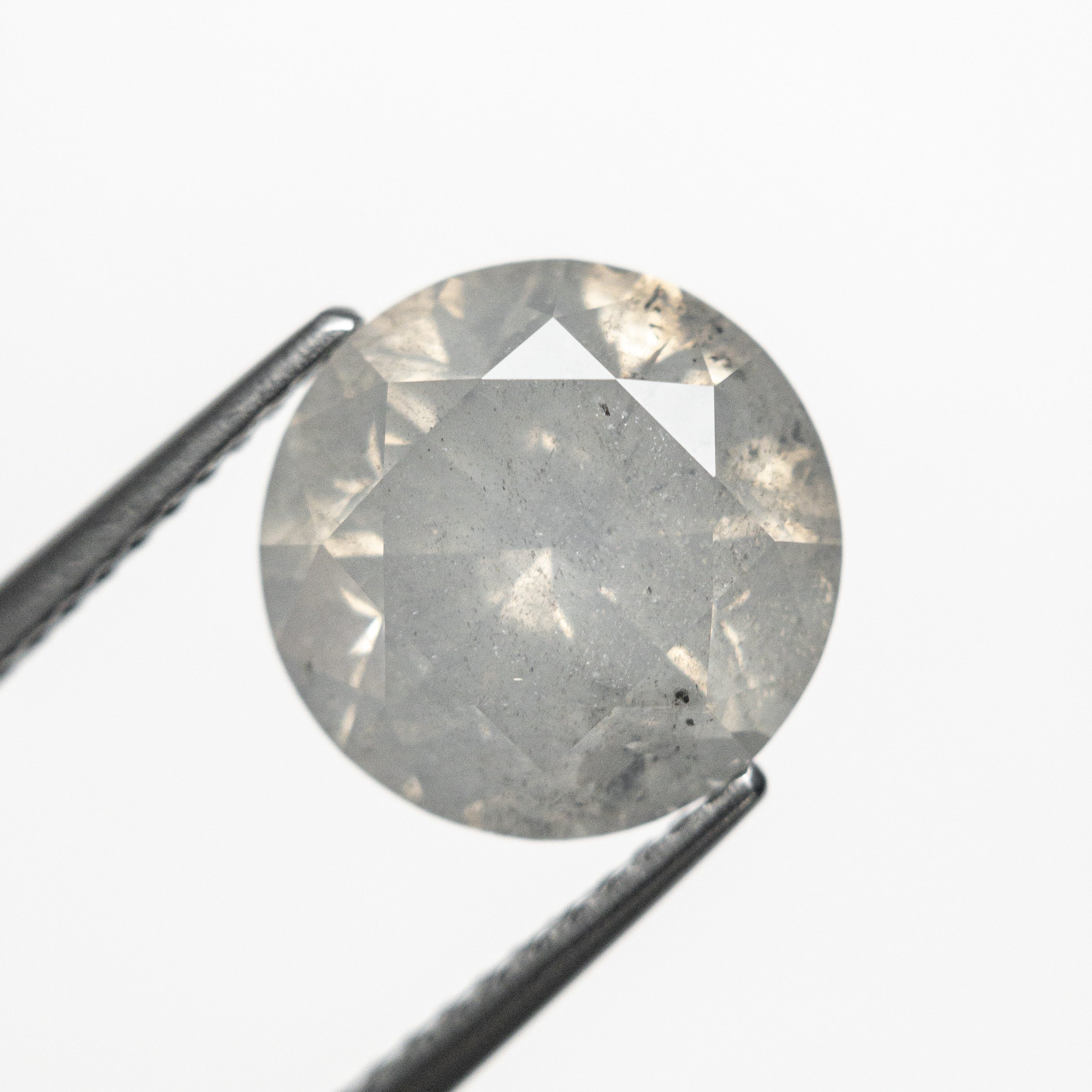 4.75ct 10.38x10.35x6.92mm Fancy White Round Brilliant 20012-01