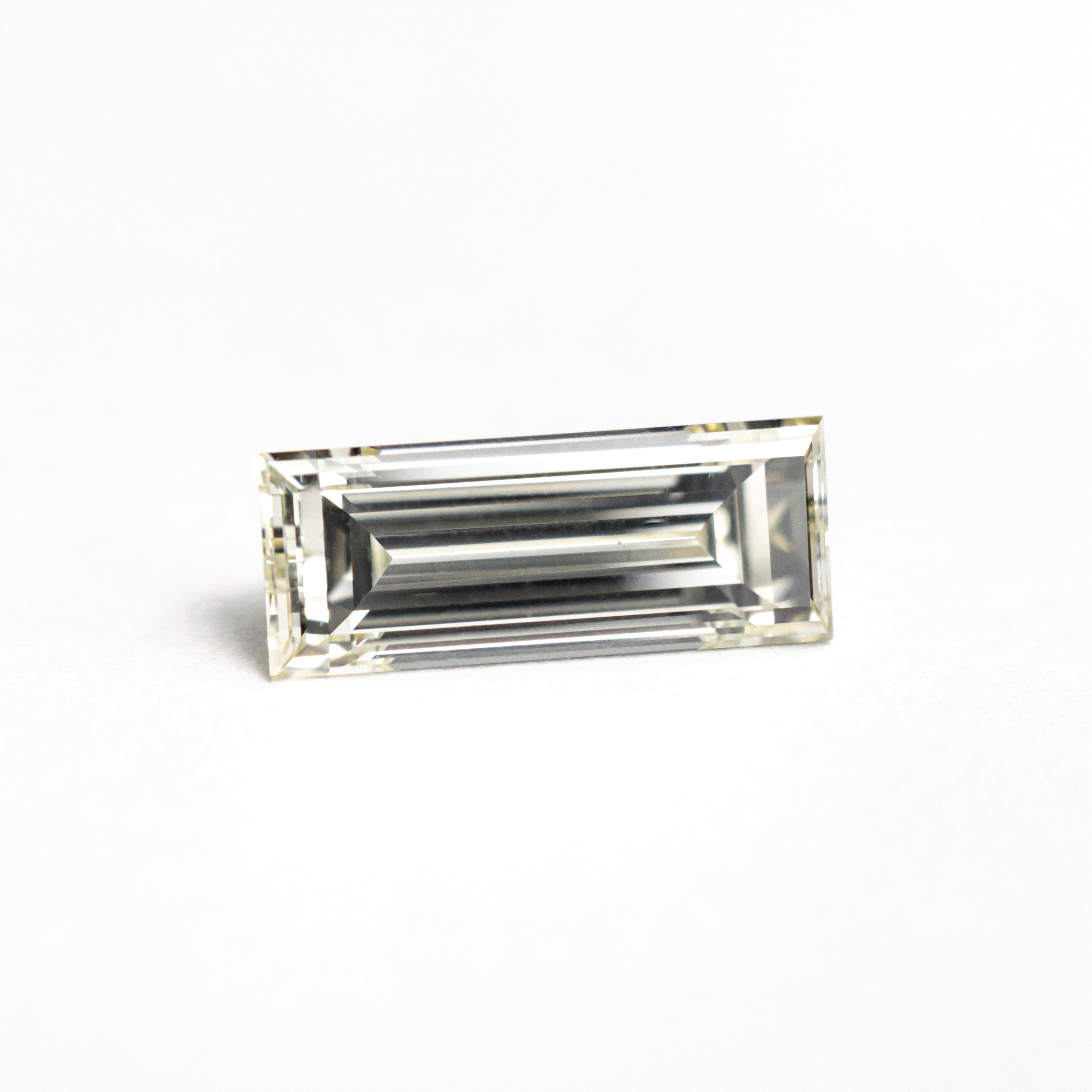 1.11ct 9.55x3.80x2.97mm VS2 O-P Baguette Step Cut 26124-02