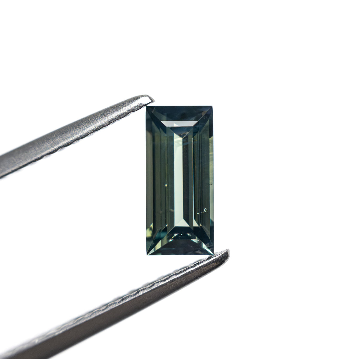 0.74ct 7.27x3.44x2.54mm Rectangle Step Cut Sapphire 27336-44