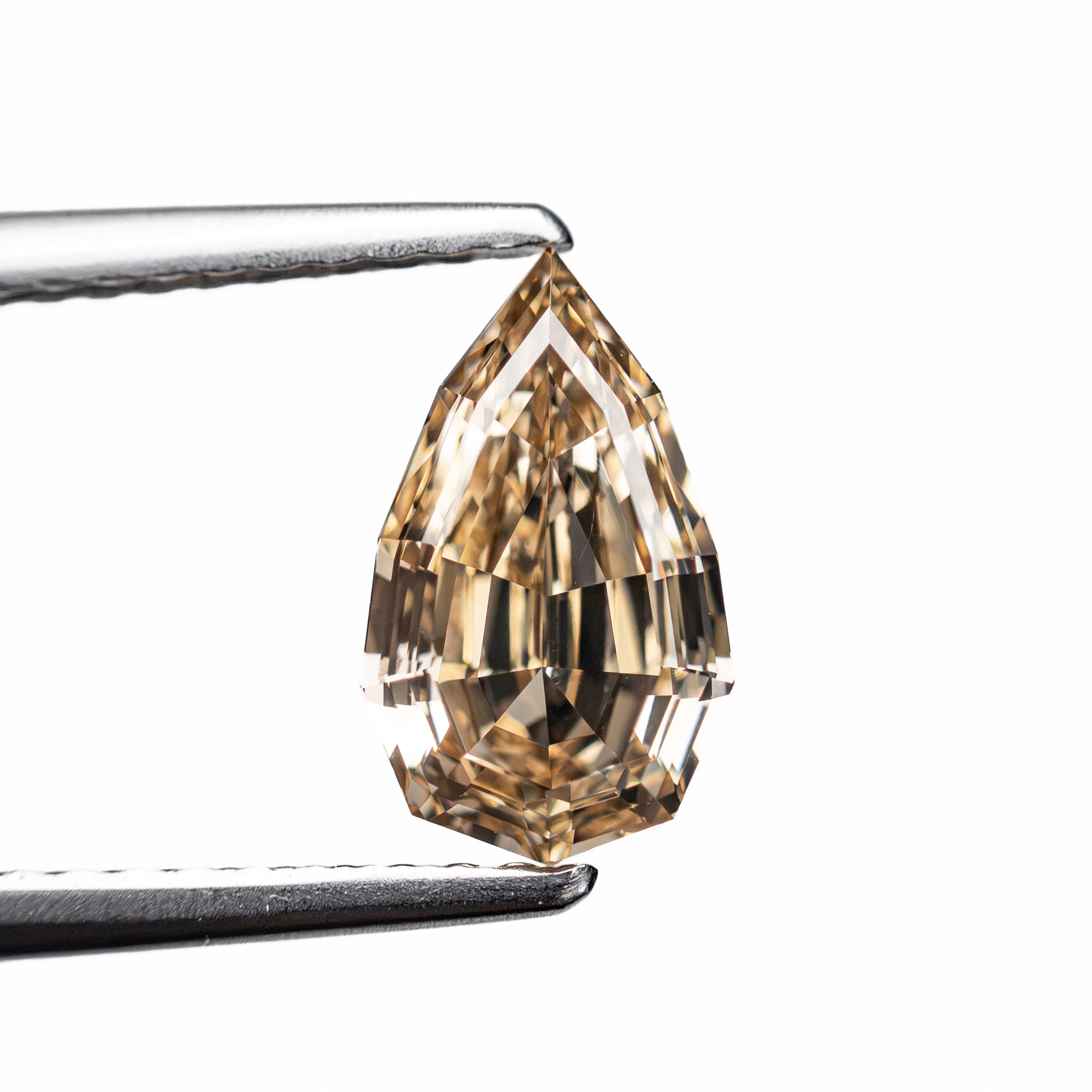 1.23ct 9.25x5.50x3.43mm VS1 Fancy Yellowish Brown Geo Pear Step Cut 28046-01