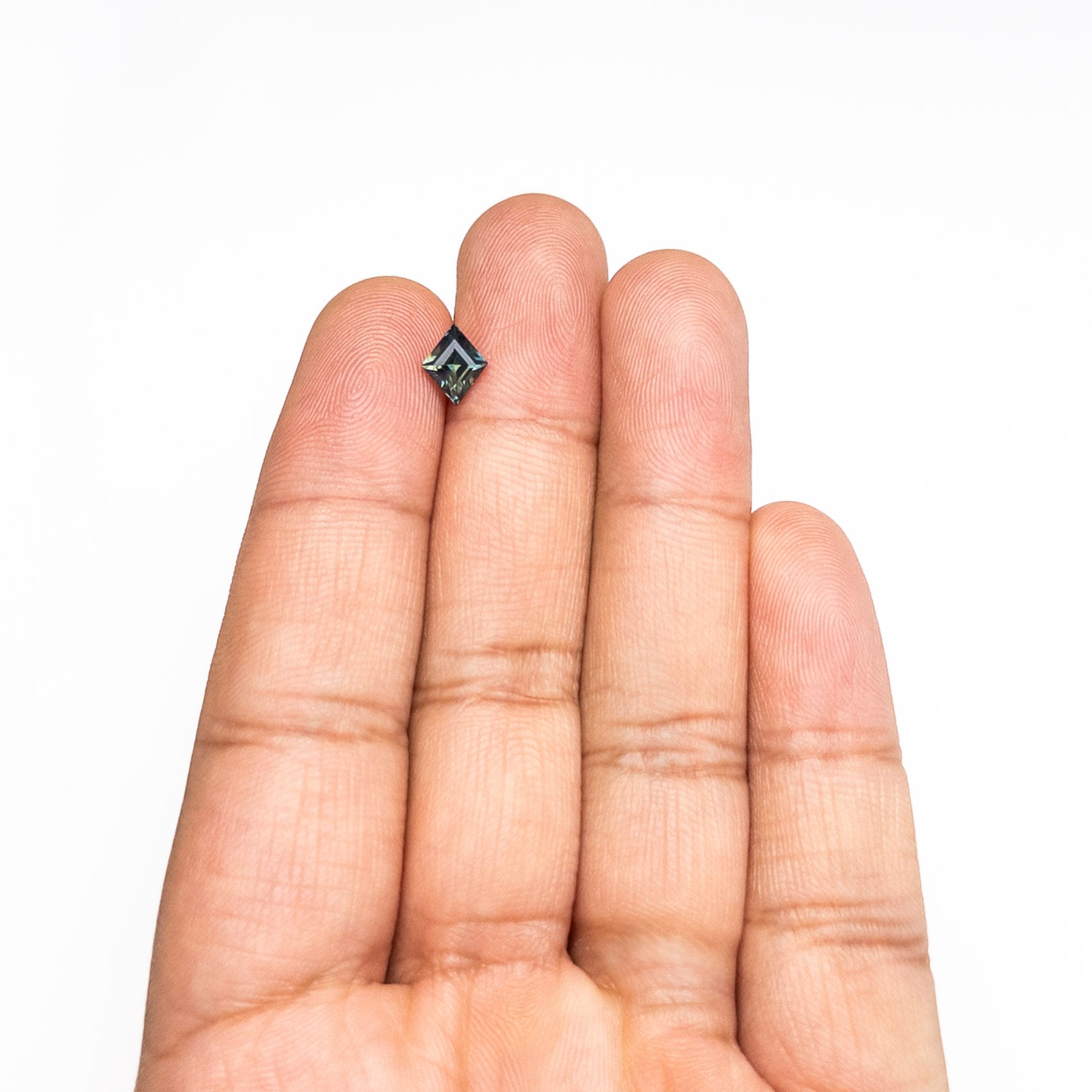 0.98ct 7.89x6.43x3.77mm Lozenge Step Cut Sapphire 28199-01