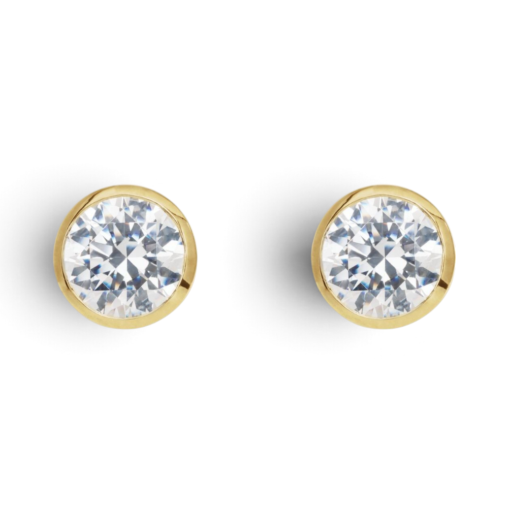 Stórica Studio Eos round lab-grown diamond stud earrings in polished 14k yellow gold bezel settings.