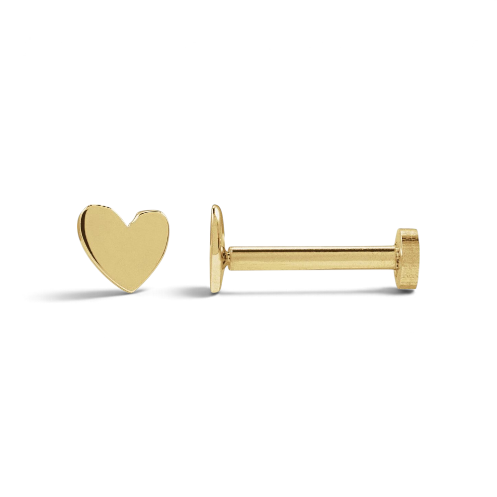 Stórica Studio 14k yellow gold petite heart stud earring with a comfortable flat-back design for everyday wear.