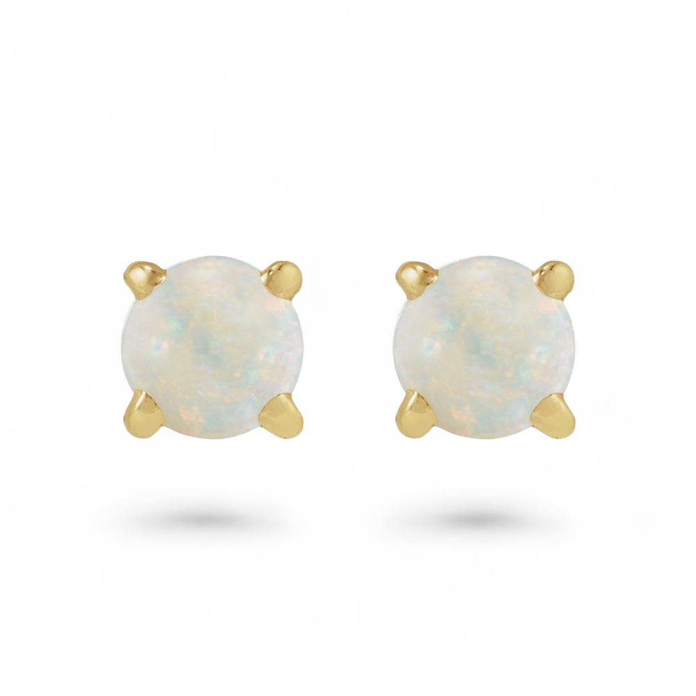 Stórica Studio 14k yellow gold stud earrings featuring 4mm round white opals with a four-prong setting.