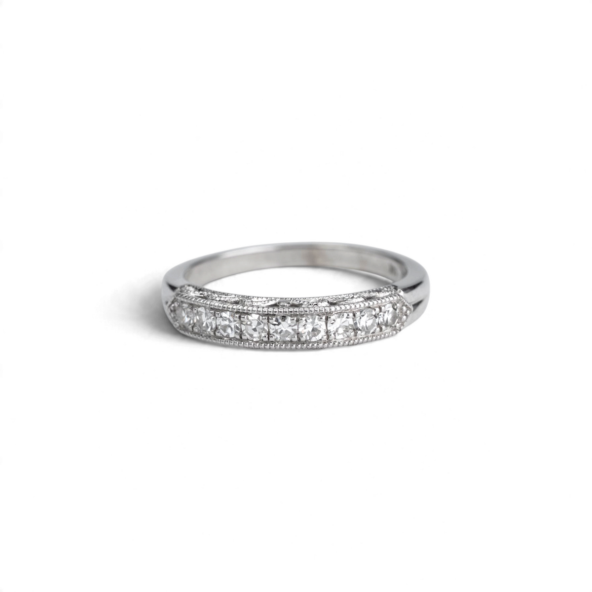 Stórica Studio Jasmine vintage diamond band in 14k white gold with a row of single cut diamonds and milgrain edges