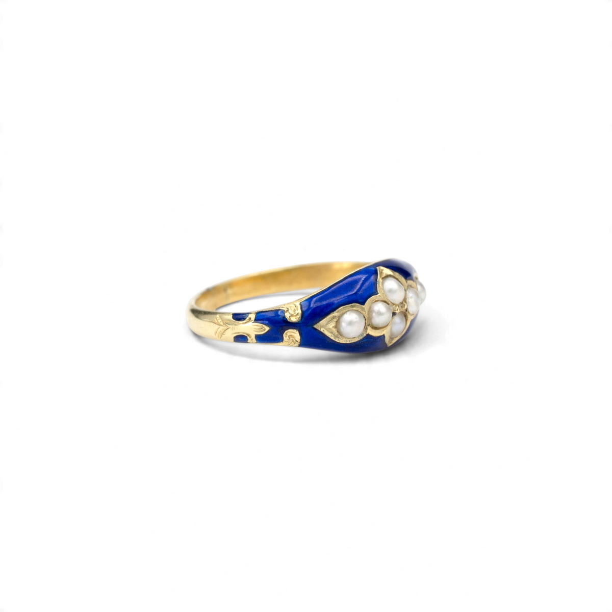 Stórica Studio 10k yellow gold ring featuring blue enamel, white pearls, and intricate engraved details.