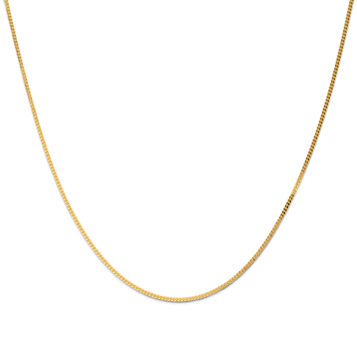 Stórica Studio 14k yellow gold baby Cuban chain necklace with delicate 1.2mm links for layering or solo wear.