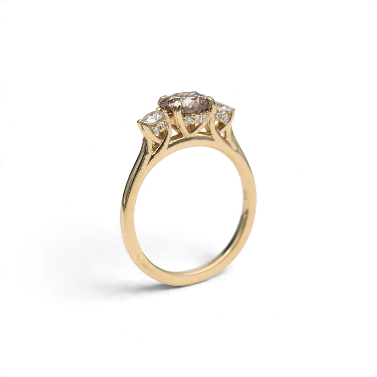 Stórica Studio Laurel champagne octagon diamond ring in 14k yellow gold showing hidden halos of tiny lab-grown diamonds