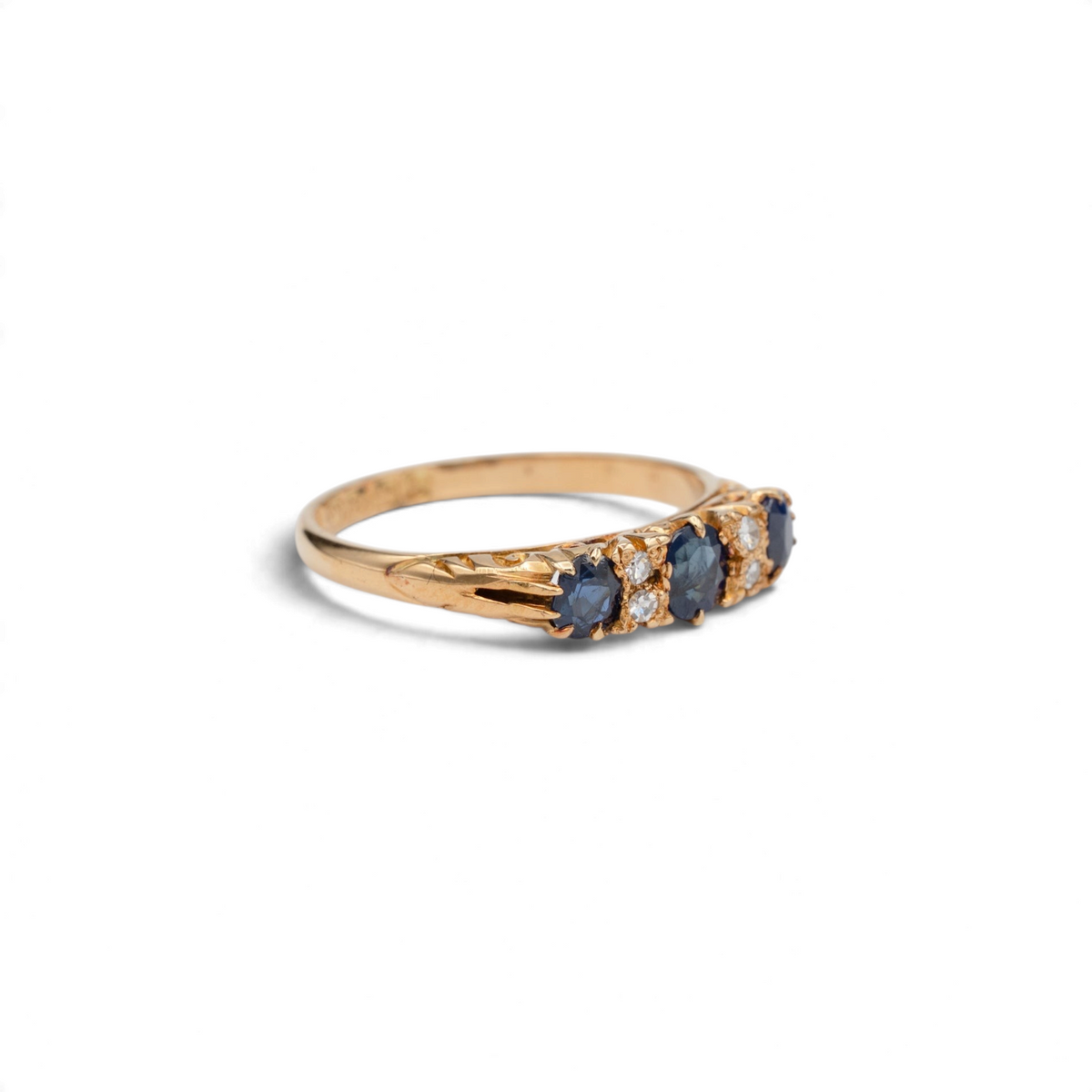 Stórica Studio Victorian 18k yellow gold half-hoop ring featuring blue sapphires and small diamonds