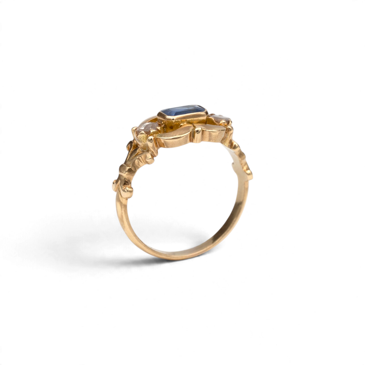 Stórica Studio Gentian Victorian emerald cut sapphire and rose cut diamond ring in 18k yellow gold