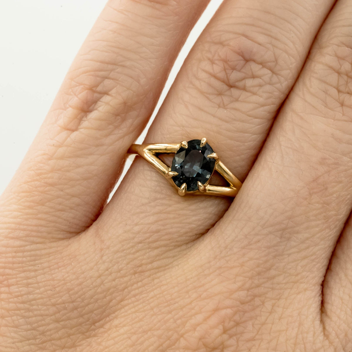 Stórica Studio Juniper engagement ring with a 1.53ct oval color-change sapphire in 14k yellow gold