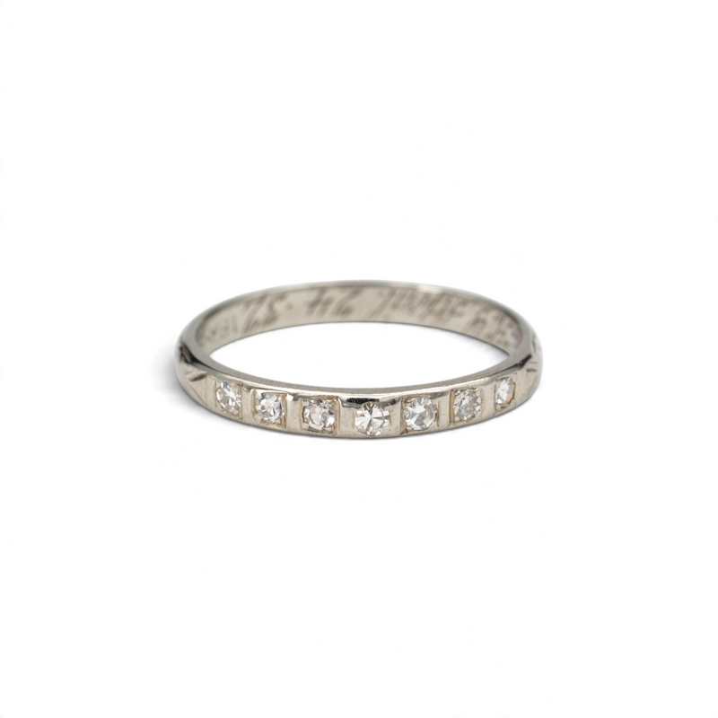 Stórica Studio Edelweiss Art Deco diamond band in 18k white gold with seven bead-set diamonds and a 1932 inscription