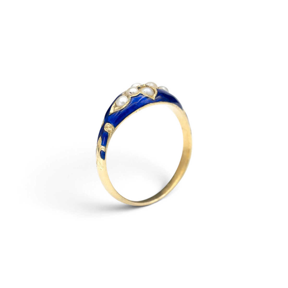 Stórica Studio 10k yellow gold ring featuring blue enamel detailing and small white pearls in a delicate band design.