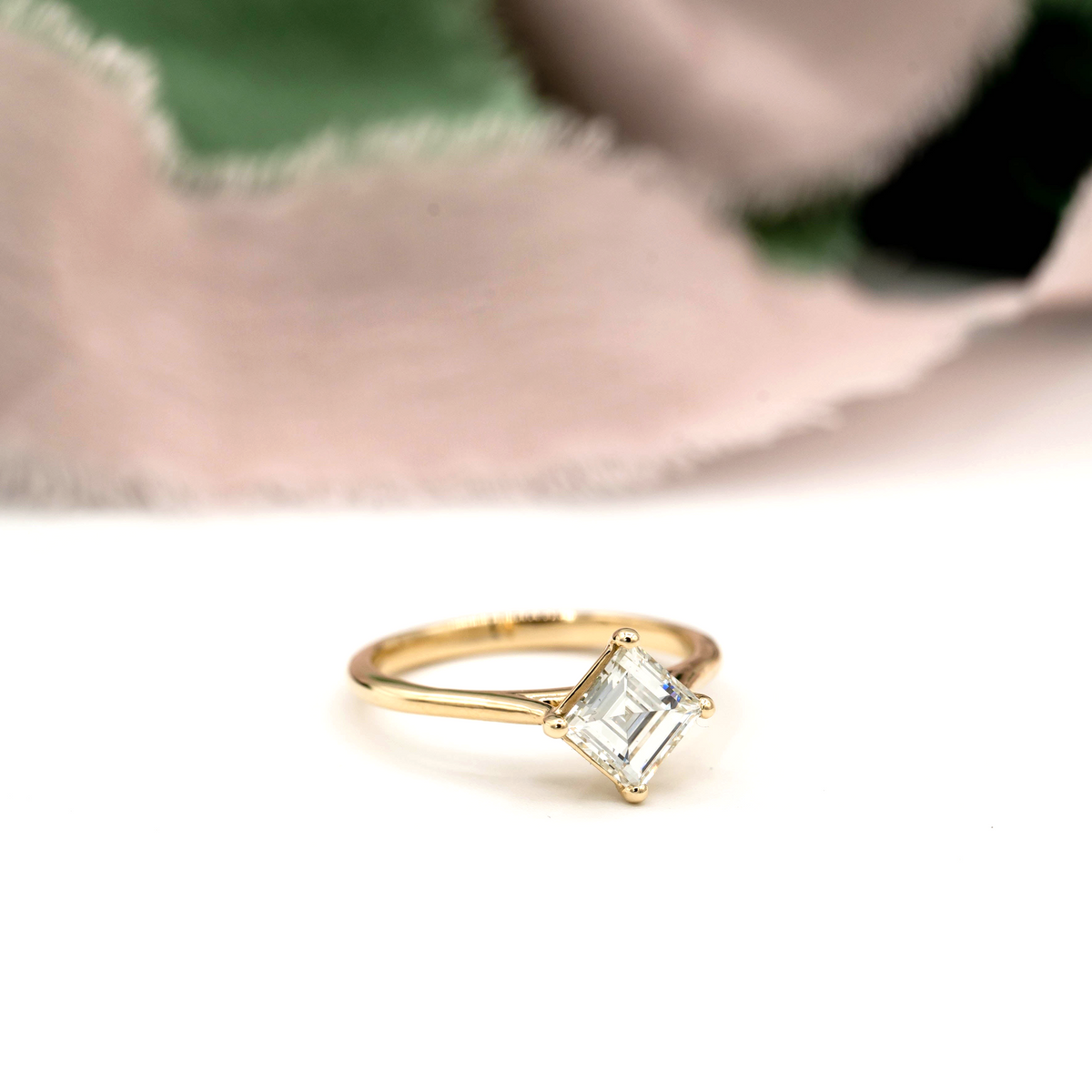 Stórica Studio Sequoia engagement ring featuring a 1.22ct antique carré cut diamond set in 14k yellow gold.