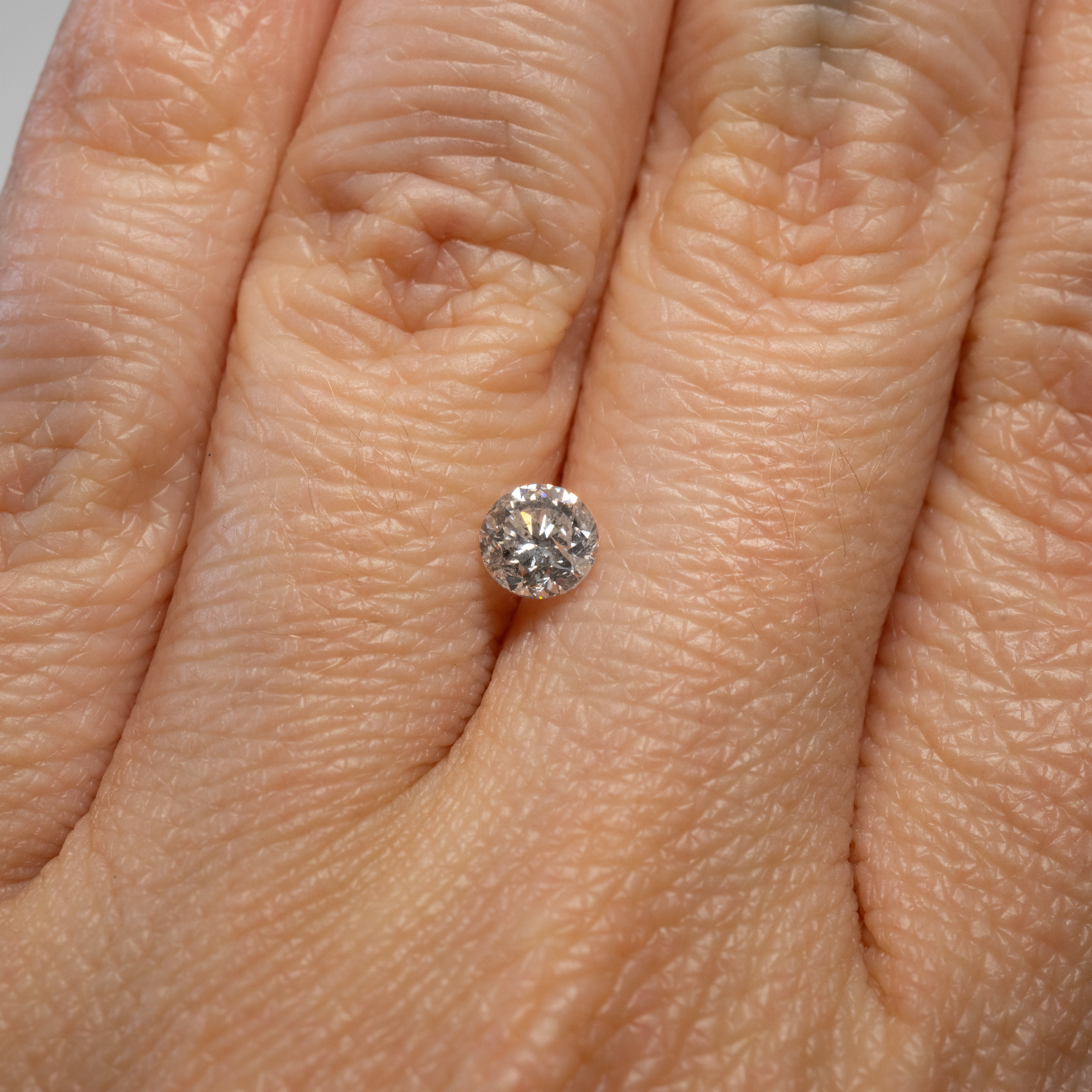 Round Brilliant Salt + Pepper Diamond | 0.58ct | Canada Origin