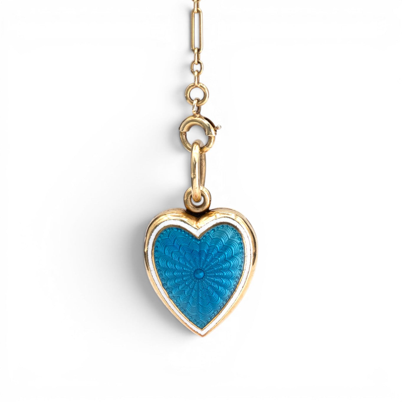 Stórica Studio antique 14K gold heart locket with blue guilloché enamel and white border on a matching chain