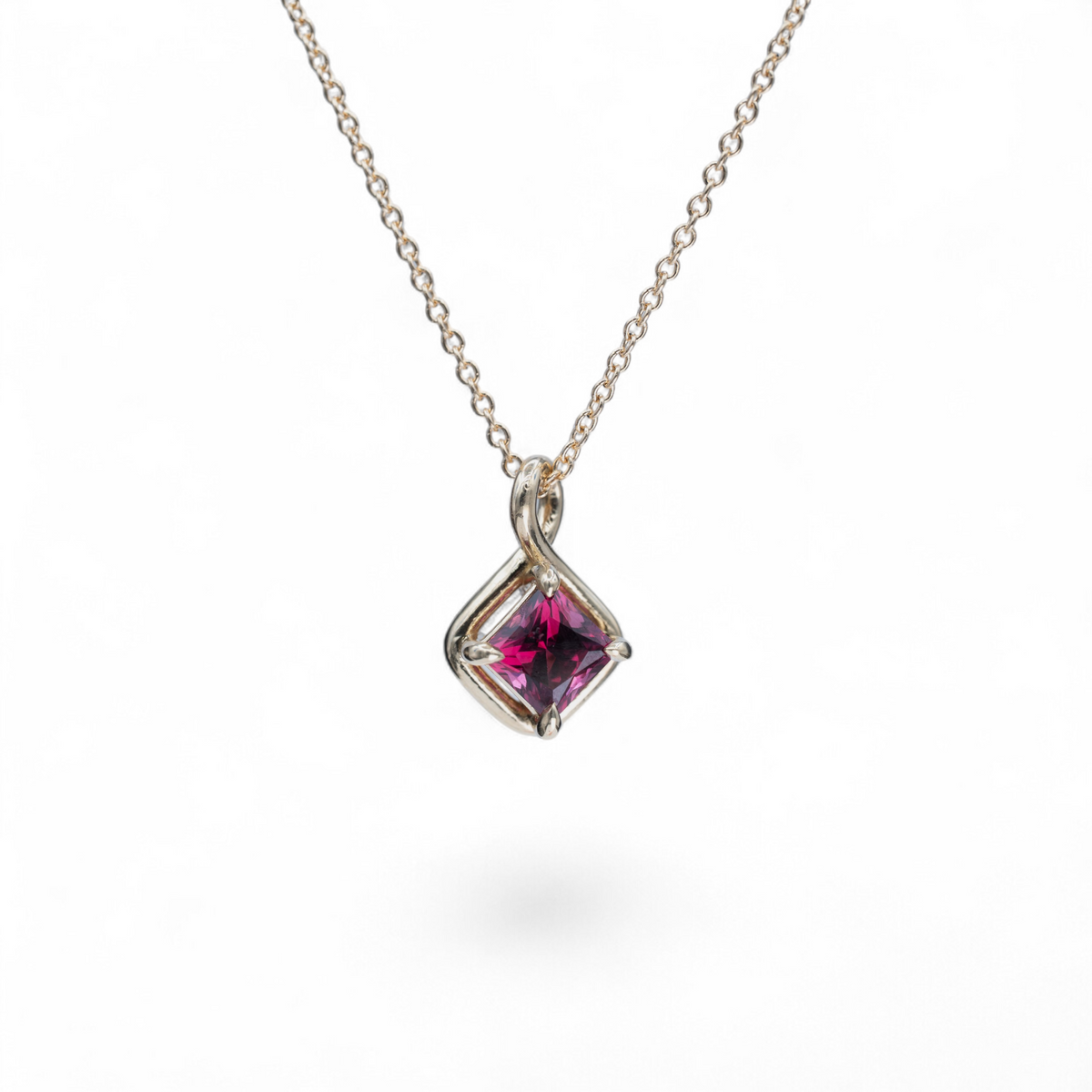Dahlia square raspberry spinel charm in 14k yellow gold on an 18 inch cable chain