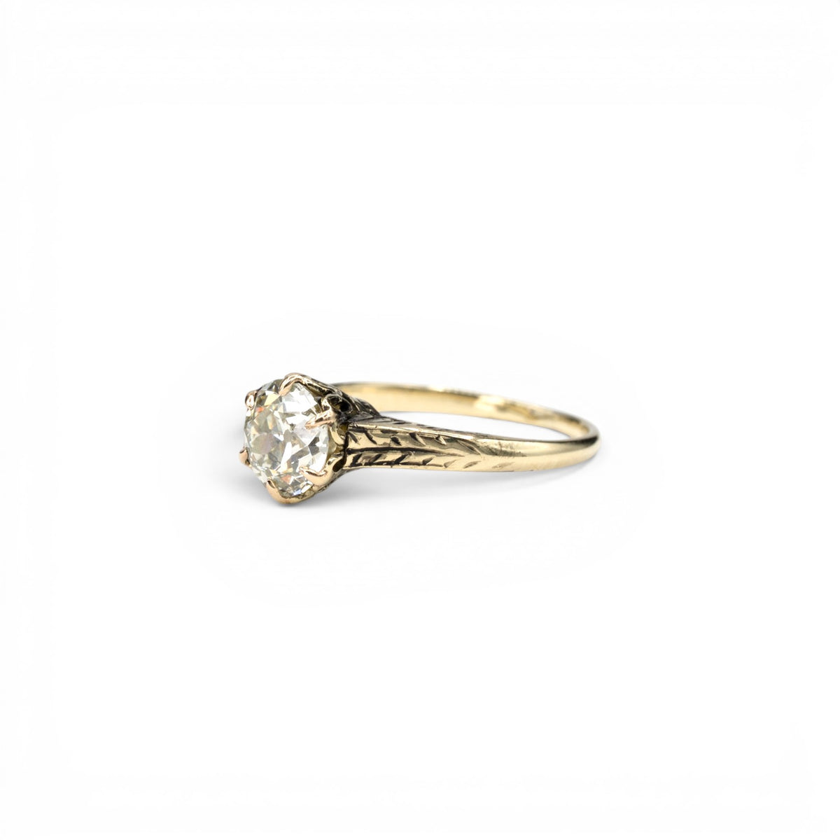 Stórica Studio Victorian 14k yellow gold ring with a 1.49ct Old European cut diamond solitaire and engraved band.