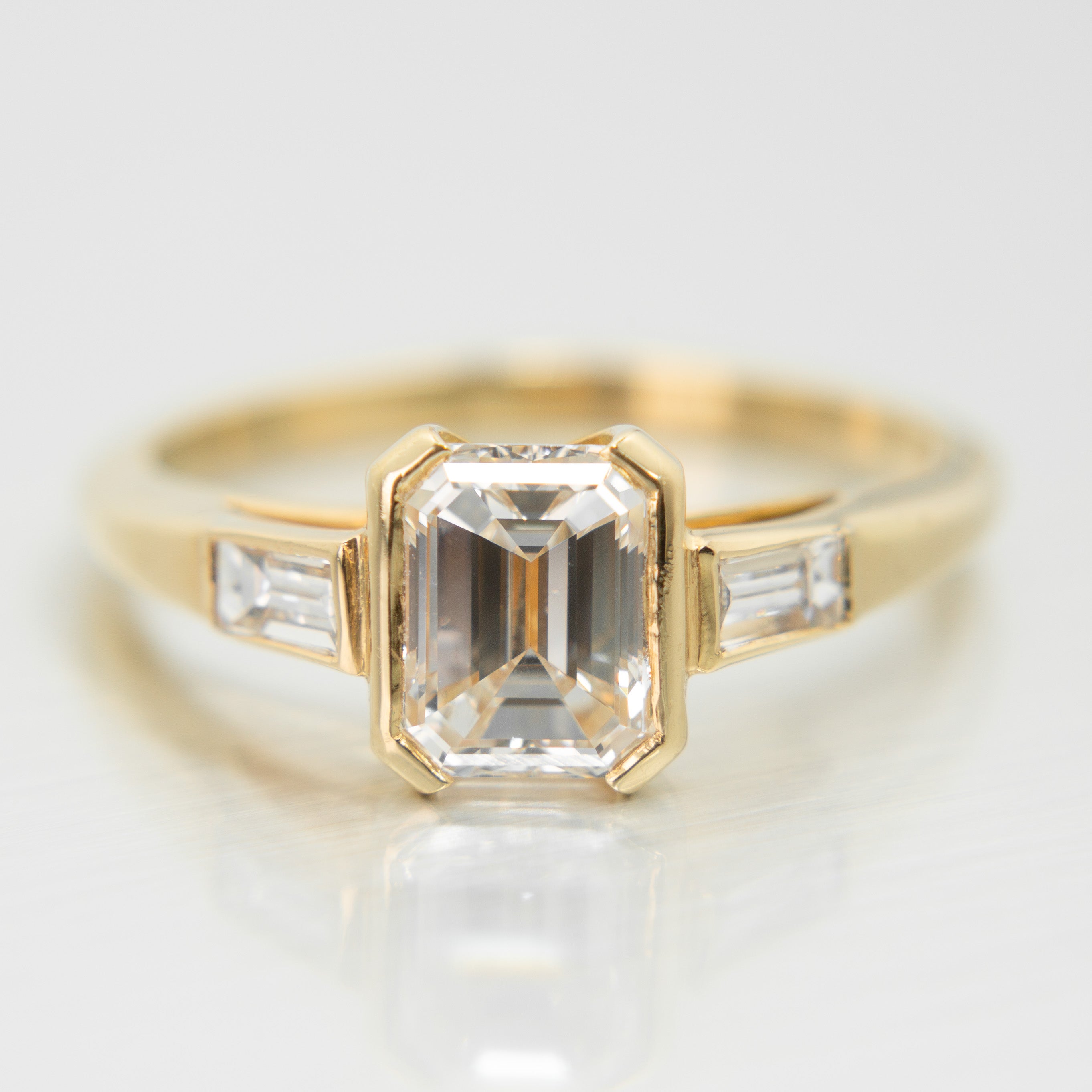 Emerald Cut Diamond Trilogy Ring in 18k Yellow Gold in Seattle