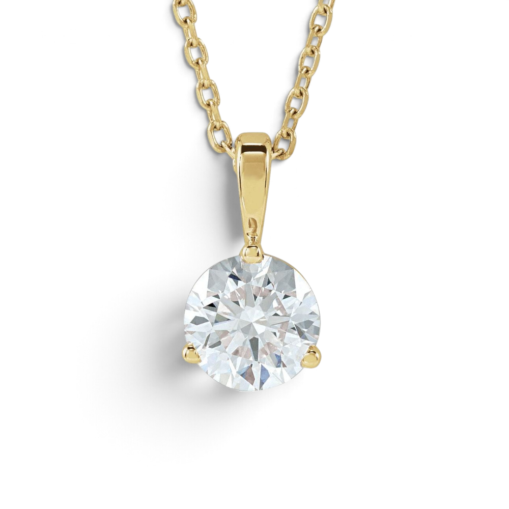 Stórica Studio Vesper necklace featuring a round lab-grown diamond in a 14k yellow gold three-prong solitaire setting.