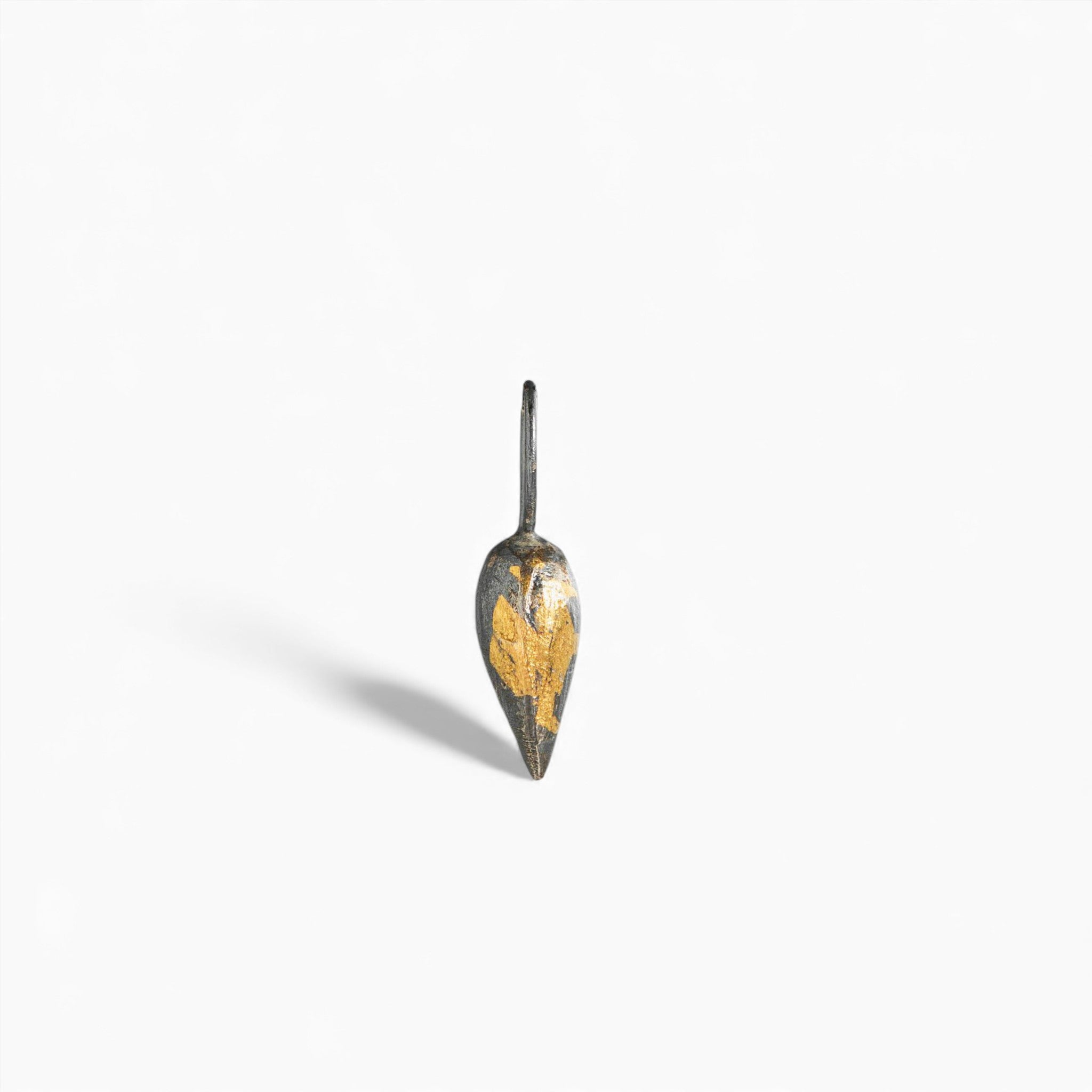 Gilded Relic Droplet Charm