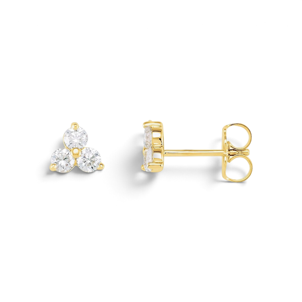 Stórica Studio Trillium stud earrings featuring three round natural diamonds set in 14k yellow gold cluster settings.