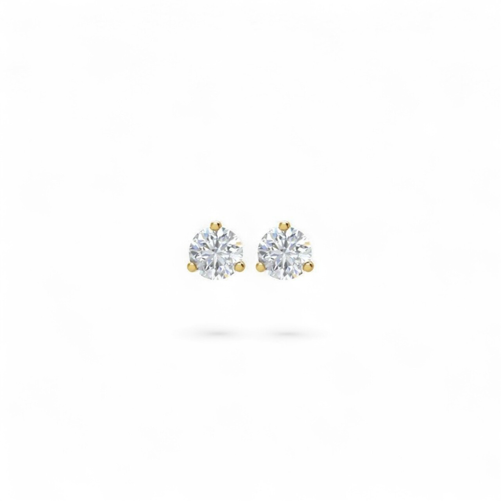 Stórica Studio Vesper stud earrings featuring round brilliant lab-grown diamonds in a 14k yellow gold three-prong setting