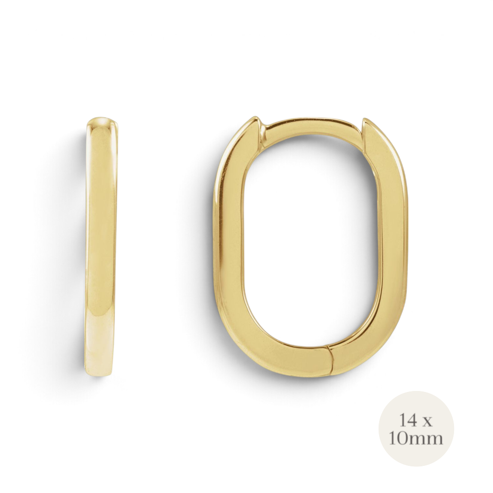 Stórica Studio Drift Hoops featuring solid polished 14k yellow gold in an elongated oval huggie design.
