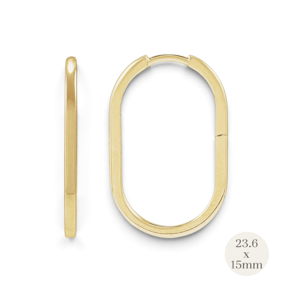 Stórica Studio Drift Hoops featuring a solid polished yellow gold elongated oval design with a hinged click closure.