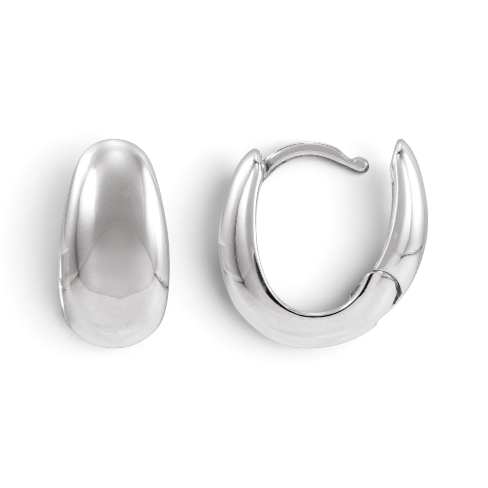 Stórica Studio Buoy puffed huggie hoop earrings in polished solid sterling silver with a hinged click closure.