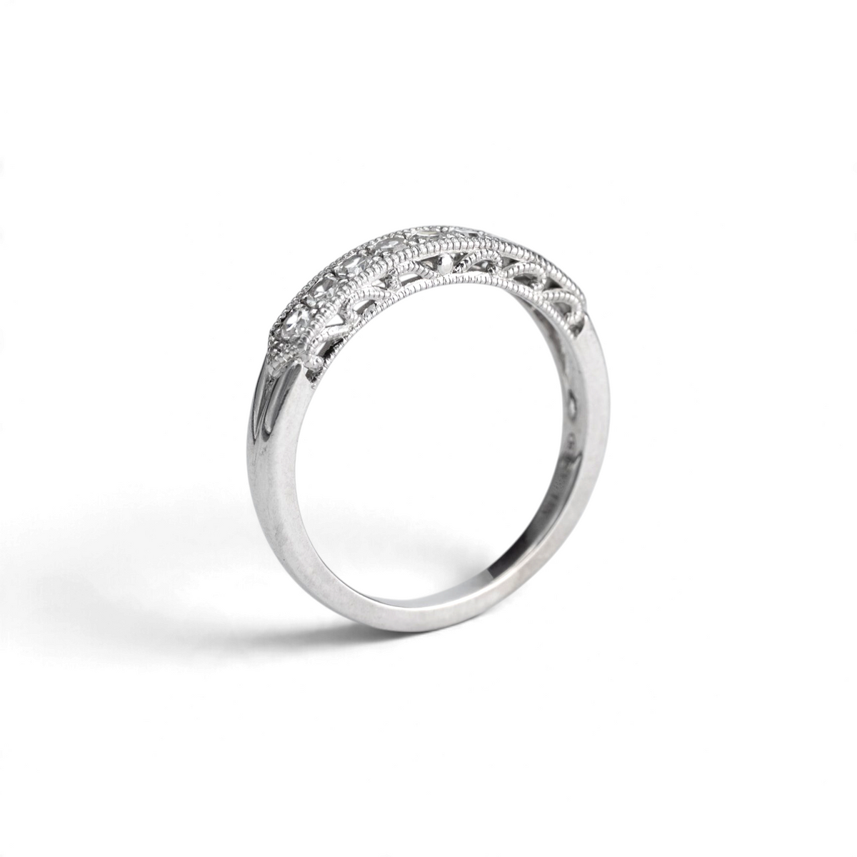 Stórica Studio Jasmine diamond band showing the pierced filigree gallery in 14k white gold