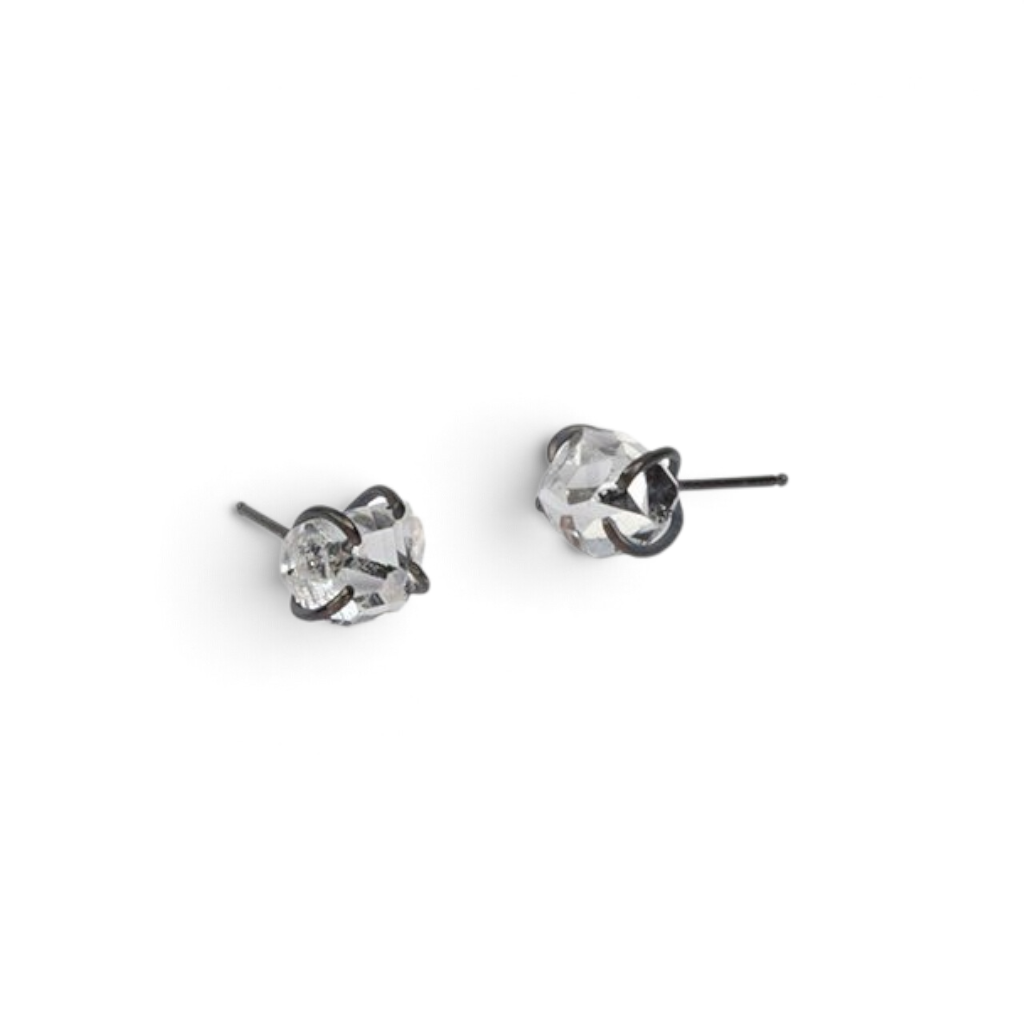 Stórica Studio herkimer diamond stud earrings in oxidized sterling silver with 4-prong settings on a white background.
