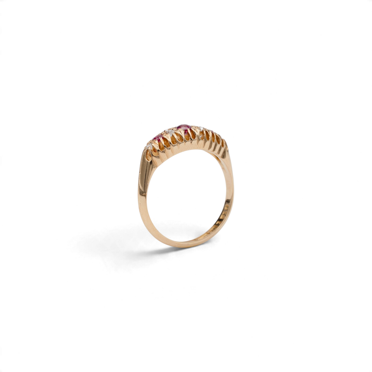 Stórica Studio antique 18k yellow gold half hoop ring featuring ruby and diamond stones, circa 1919.