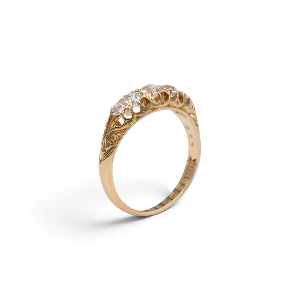 Stórica Studio Snowdrop Victorian diamond half hoop ring showing scrolled shoulders and British hallmarks