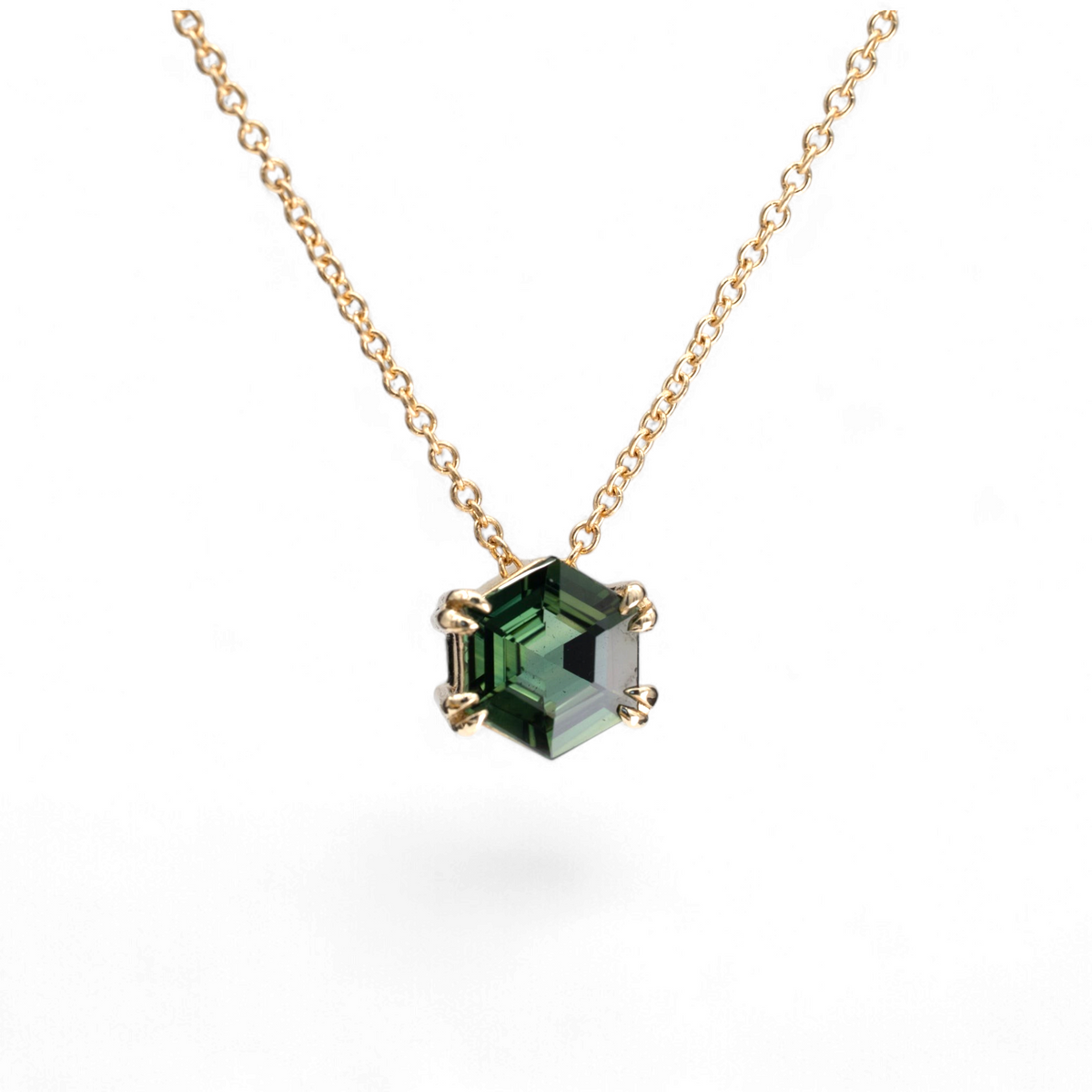 Stórica Studio 1.23ct hexagon step cut green sapphire slide necklace on a delicate gold cable chain