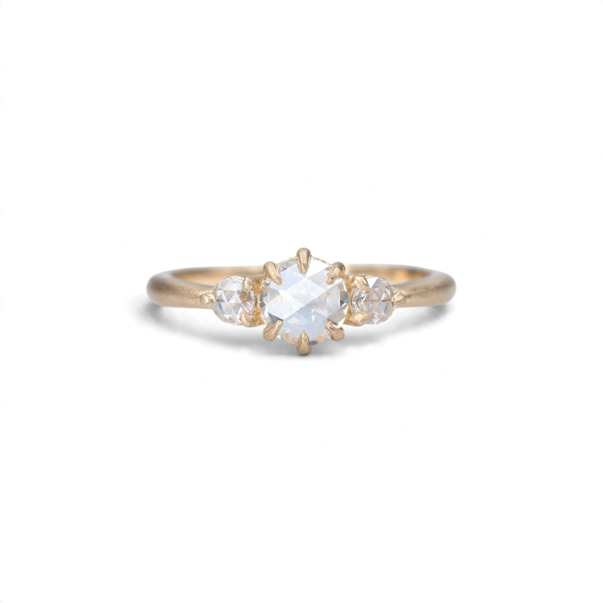 Stórica Studio The Alder three stone ring with rose cut diamonds in matte 14k yellow gold with claw prongs