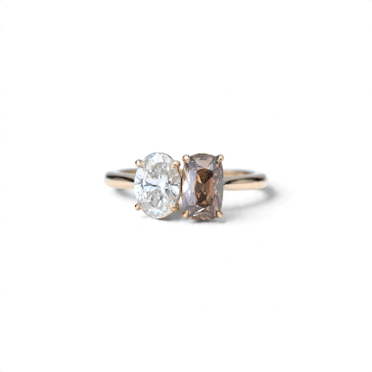 Stórica Studio toi et moi ring featuring a champagne cushion and oval lab-grown diamond in 14k yellow gold