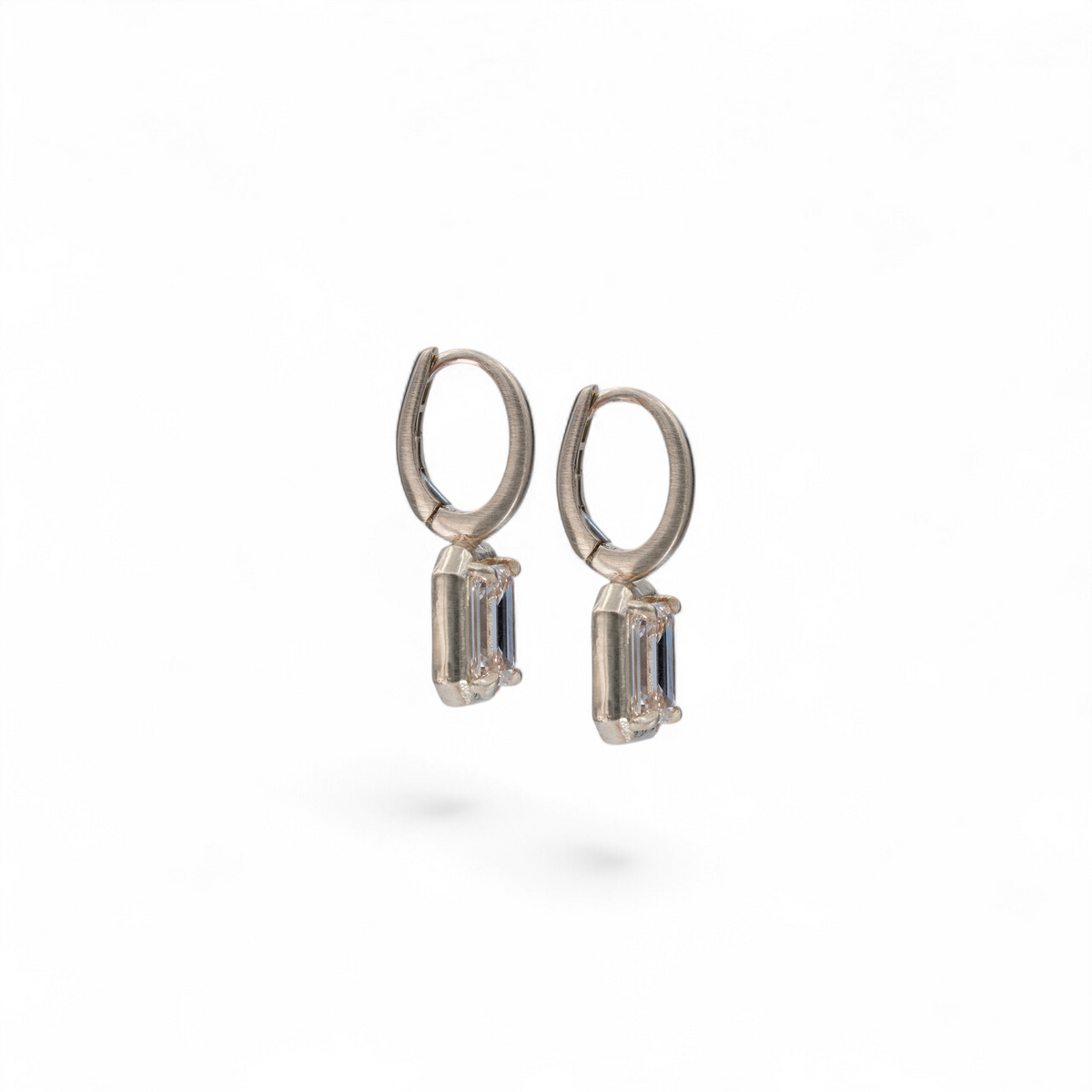 Stórica Studio champagne emerald cut lab-grown diamond earrings in satin 14k yellow gold with lever backs.