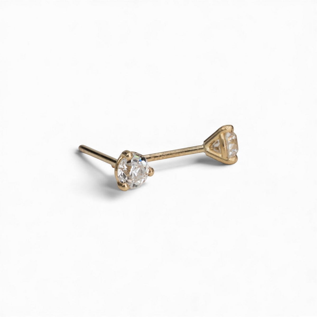 Stórica Studio Spark diamond stud earrings featuring 3.5mm old mine cut diamonds in 14k yellow gold martini settings.