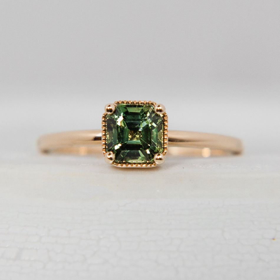 Oak Ring featuring an asscher cut sapphire.