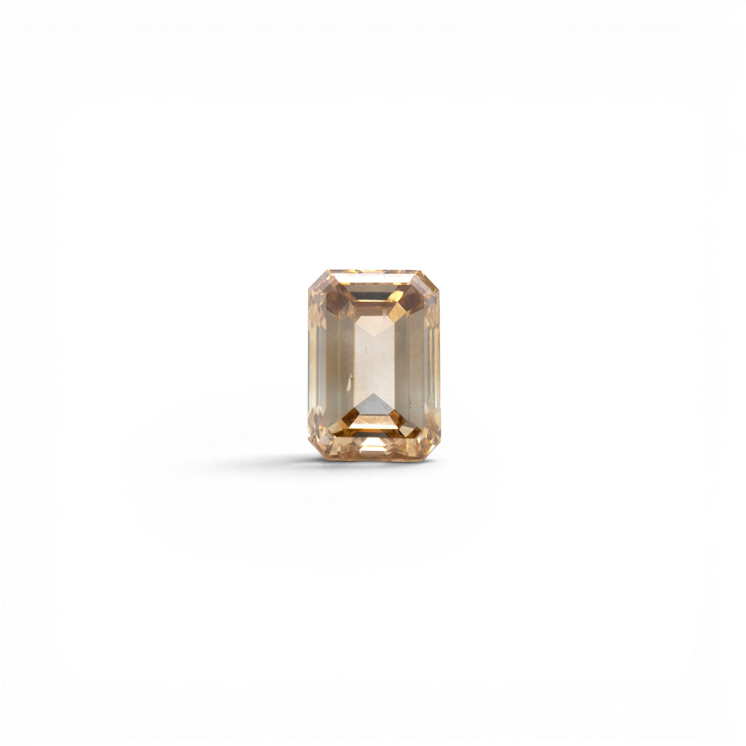 0.96ct natural earth-mined emerald cut diamond, champagne C6, SI clarity, with rich golden-amber tone, by Stórica Studio - custom engagement rings in Seattle.