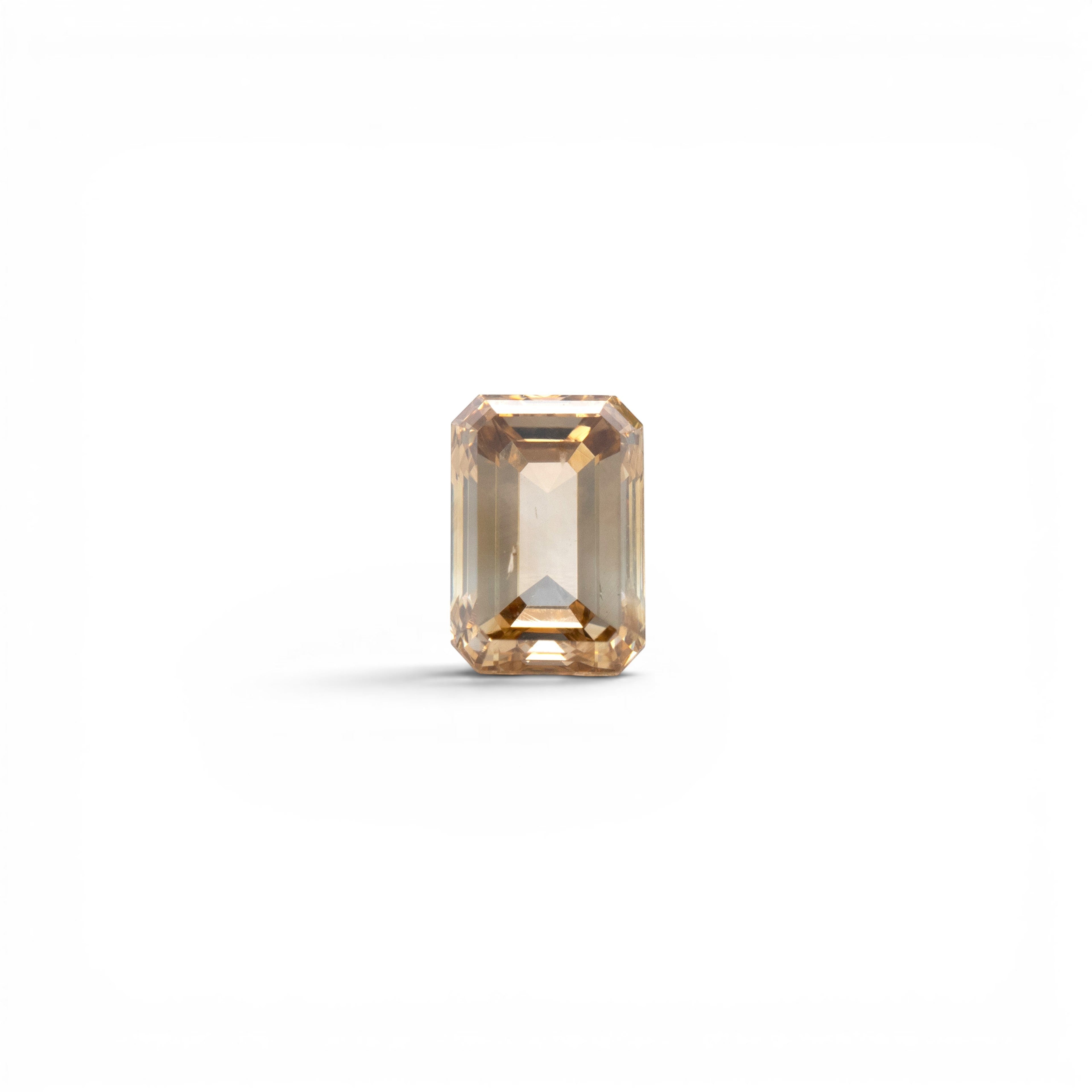 0.96ct natural earth-mined emerald cut diamond, champagne C6, SI clarity, with rich golden-amber tone, by Stórica Studio - custom engagement rings in Seattle.