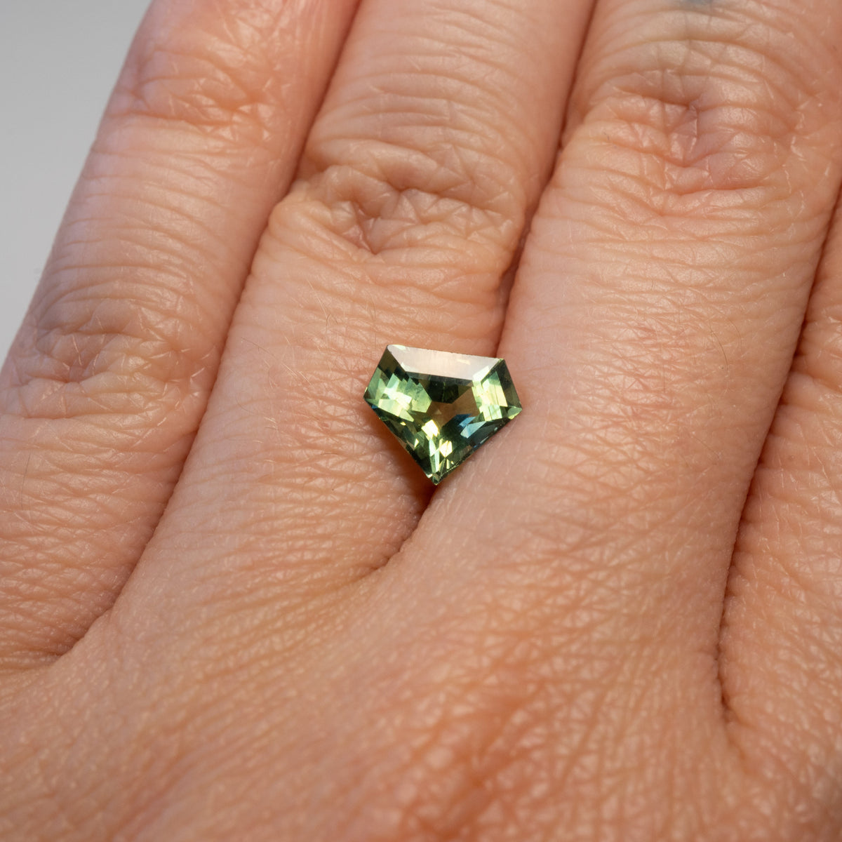 1.84ct shield cut green sapphire available loose or for a custom Stórica setting