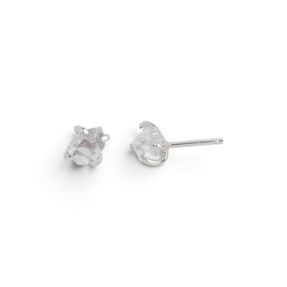Stórica Studio raw Herkimer diamond stud earrings in high shine sterling silver with a 4-prong setting.