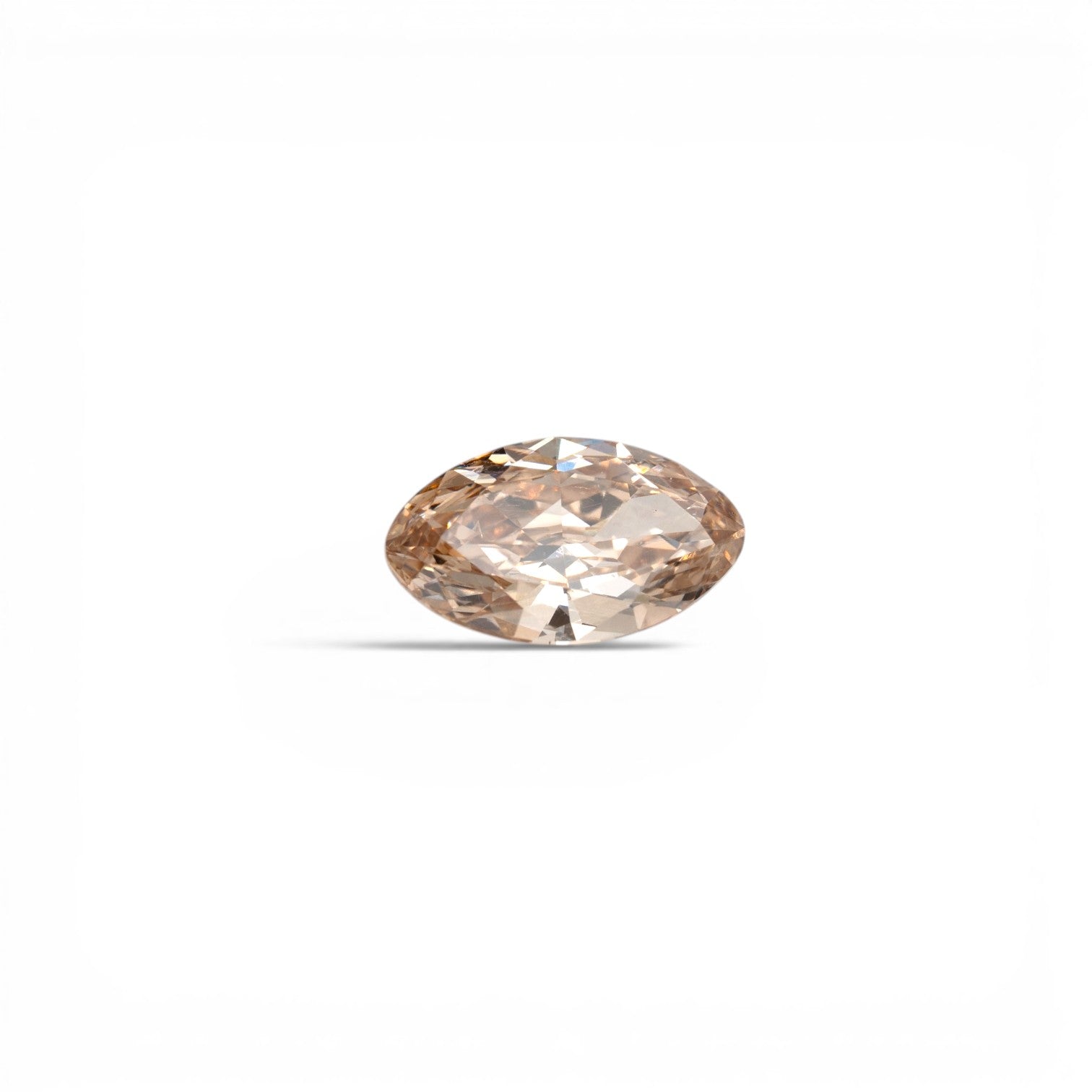 Stórica Studio custom engagement rings Seattle, 2.39ct moval lab-grown diamond in champagne C4, VS2 clarity, with warm toasty champagne tones, photographed loose on a white background.