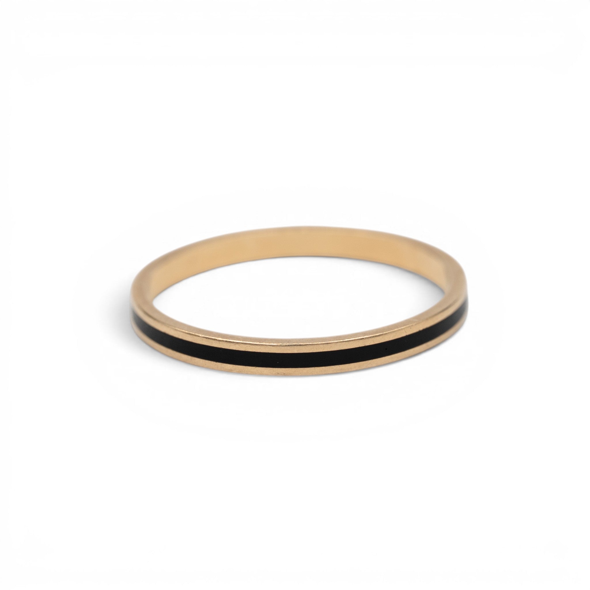 Stórica Studio 14k yellow gold band ring featuring a sleek black enamel horizon inlay on a white background.
